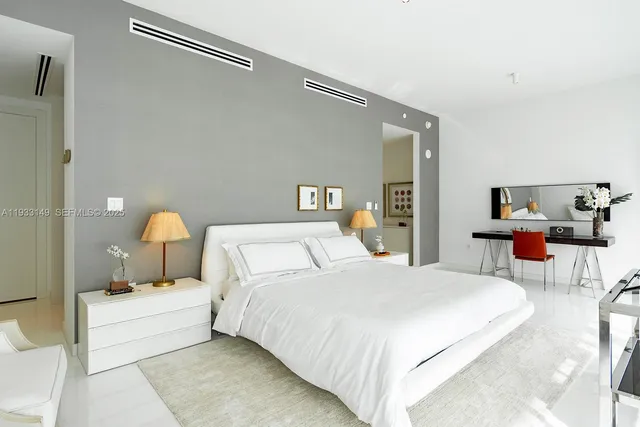 a bathroom with a tub and shower