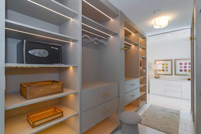 a spacious bathroom with a bathtub and sink