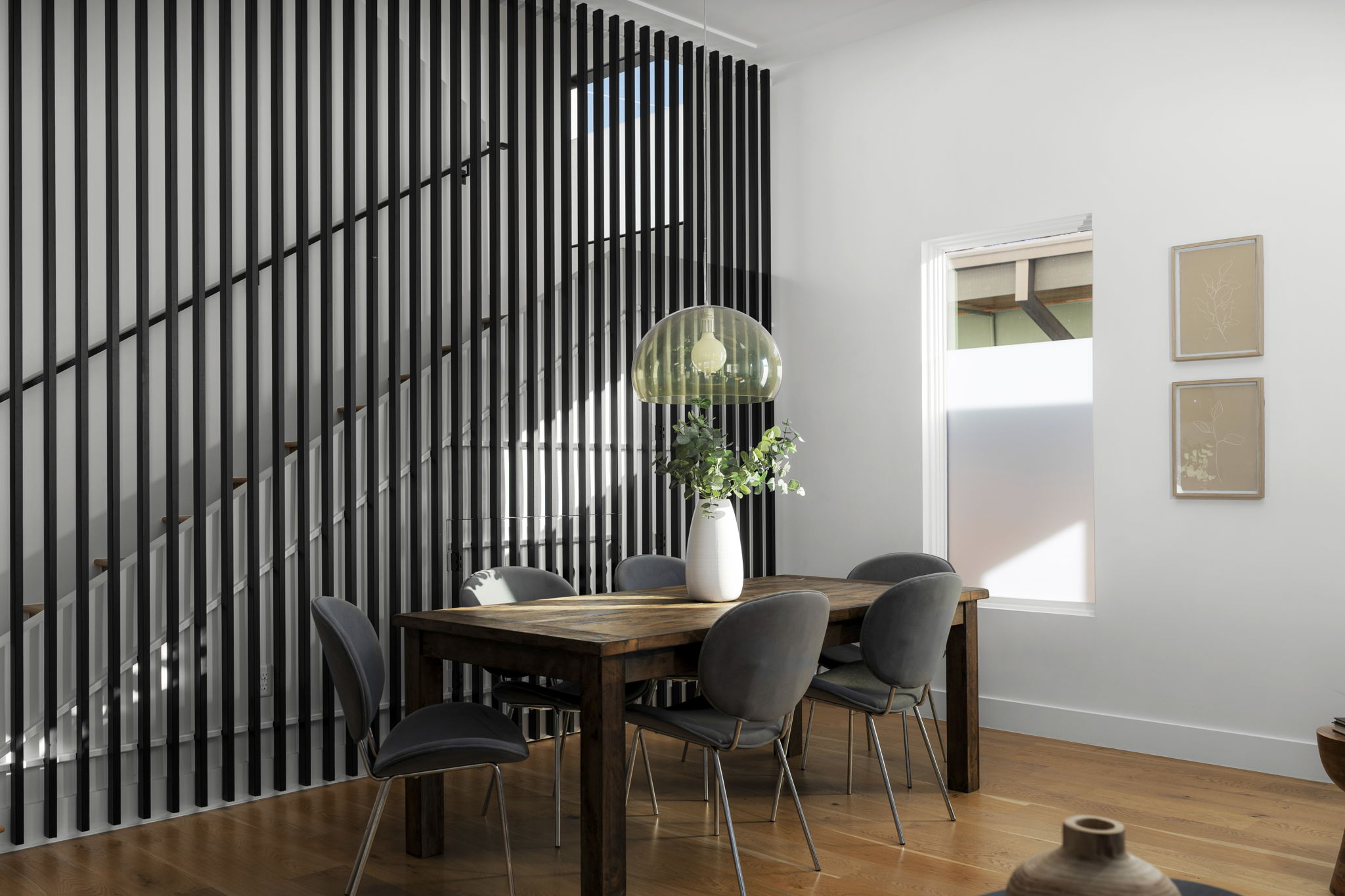 2001 Forest Trail Austin, TX 78703 - Photo 13 of 40 Dining room with wood finished floors and baseboards
