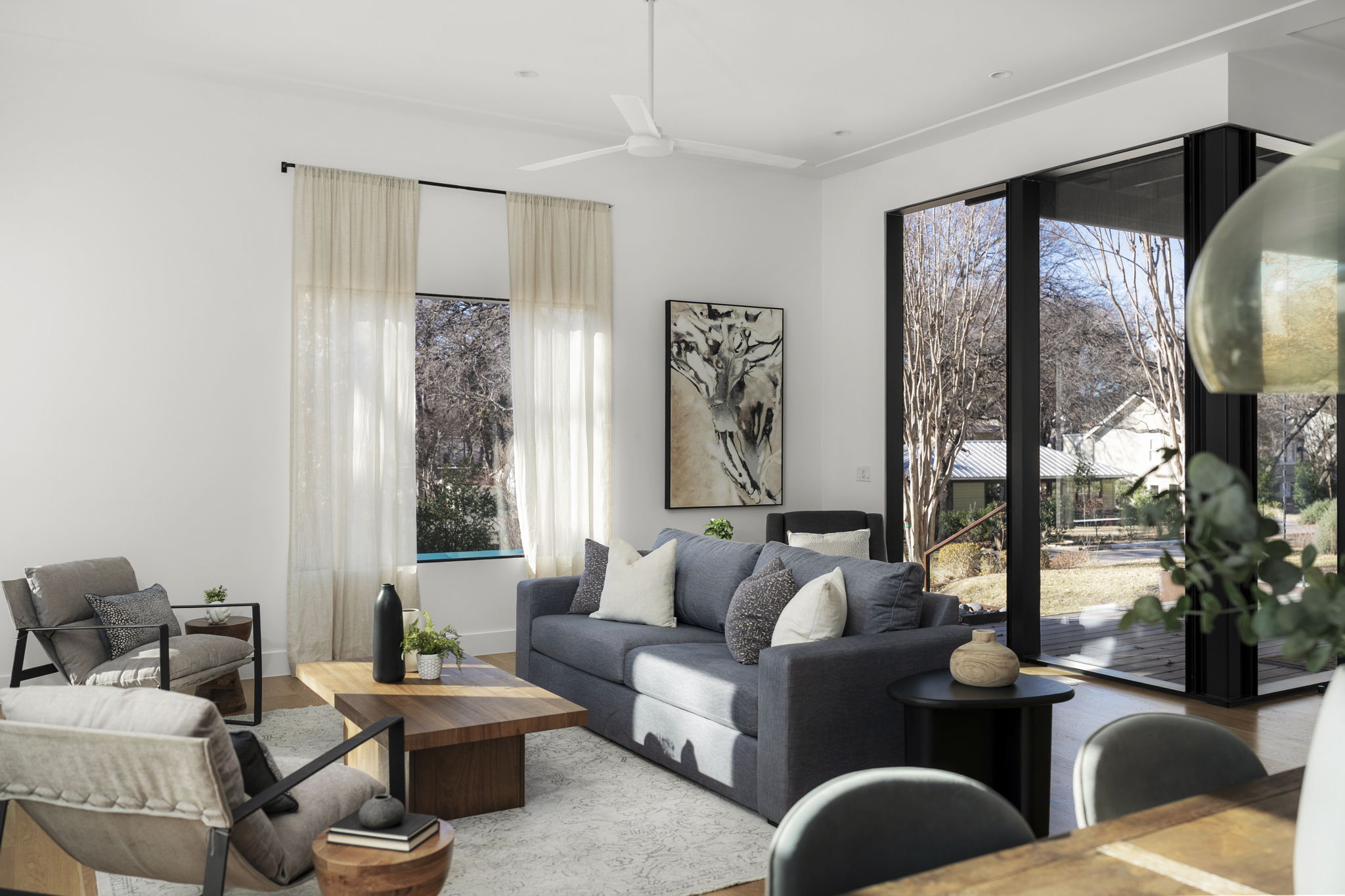 2001 Forest Trail Austin, TX 78703 - Photo 14 of 40 Living room with wood finished floors and ceiling fan