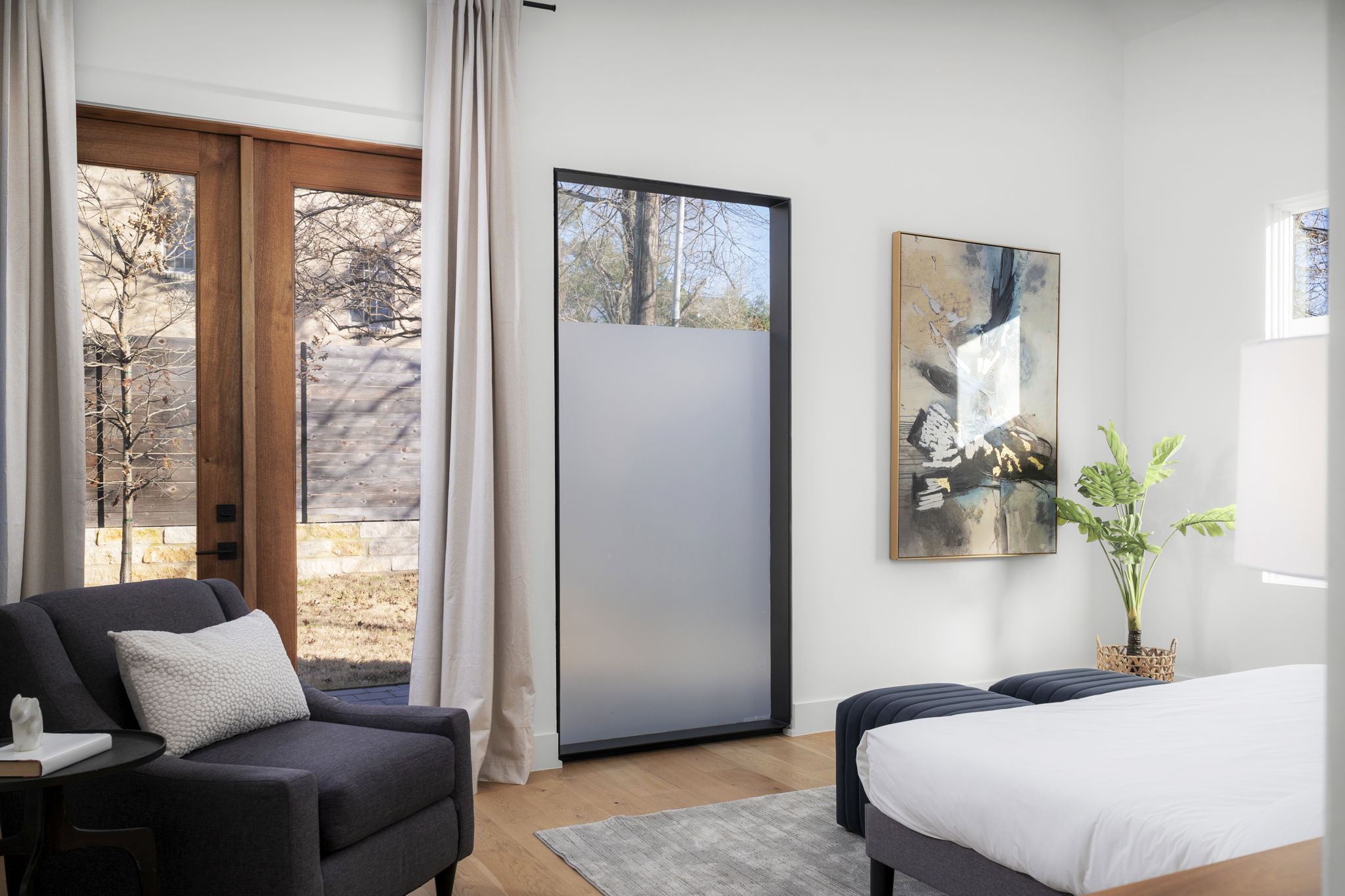 2001 Forest Trail Austin, TX 78703 - Photo 17 of 40 Bedroom with light wood-style flooring