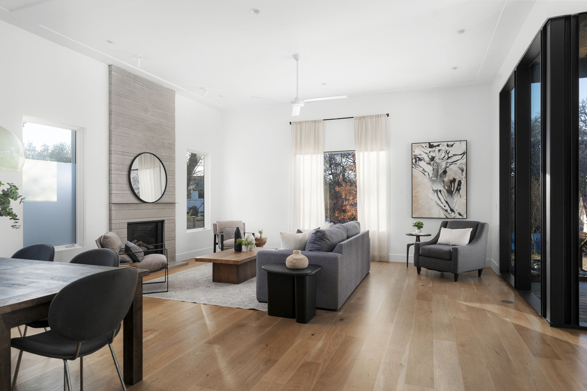 2001 Forest Trail Austin, TX 78703 - Photo 5 of 40 Living area featuring light wood finished floors and a large fireplace