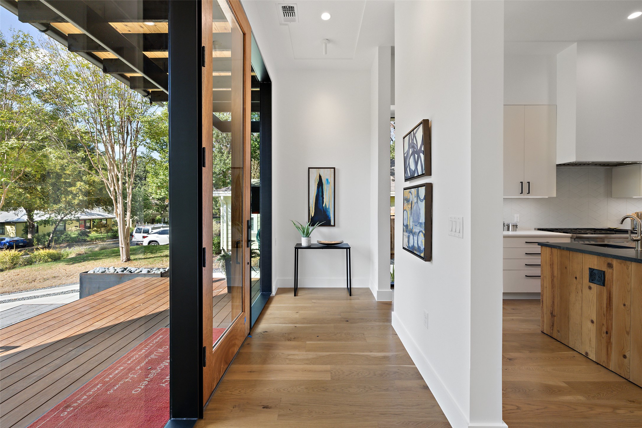 2001 Forest Trail Austin, TX 78703 - Photo 6 of 40 Hallway with light wood finished floors and recessed lighting