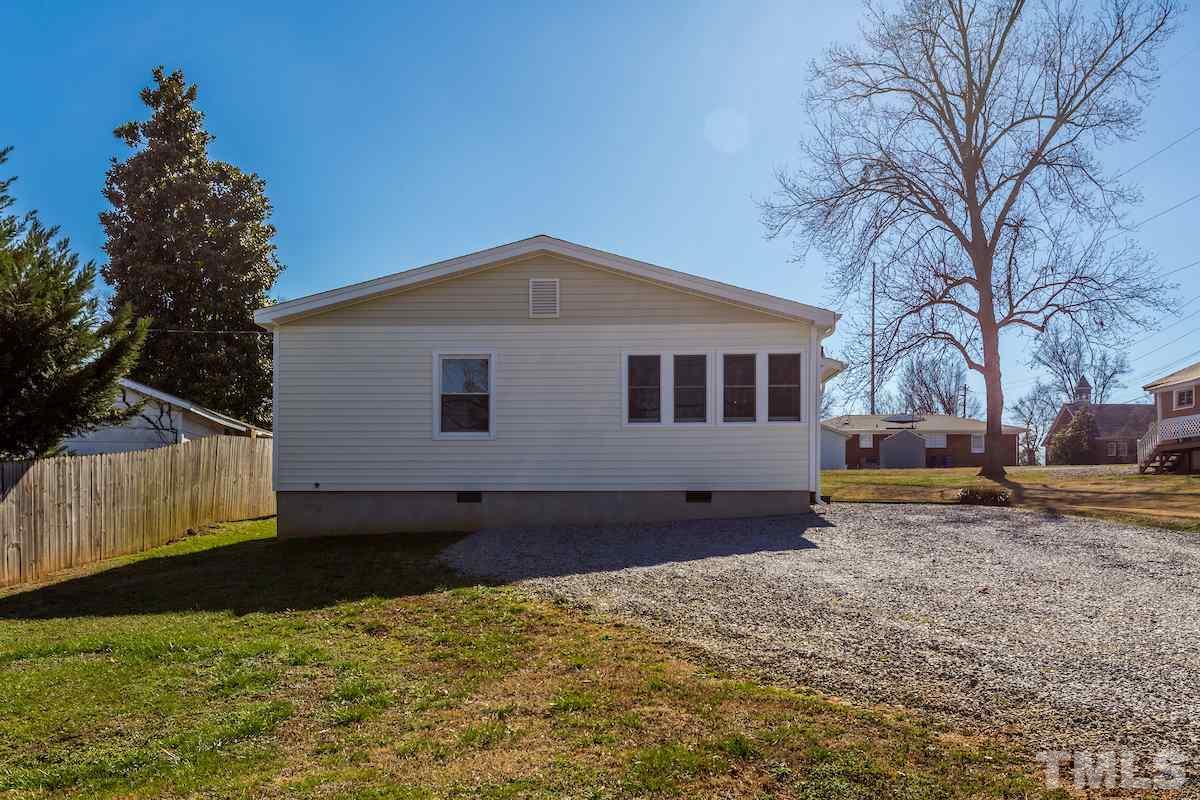 161 Prospect Avenue Raleigh, NC 27603 - Photo 2 of 24 a front view of a house with a yard