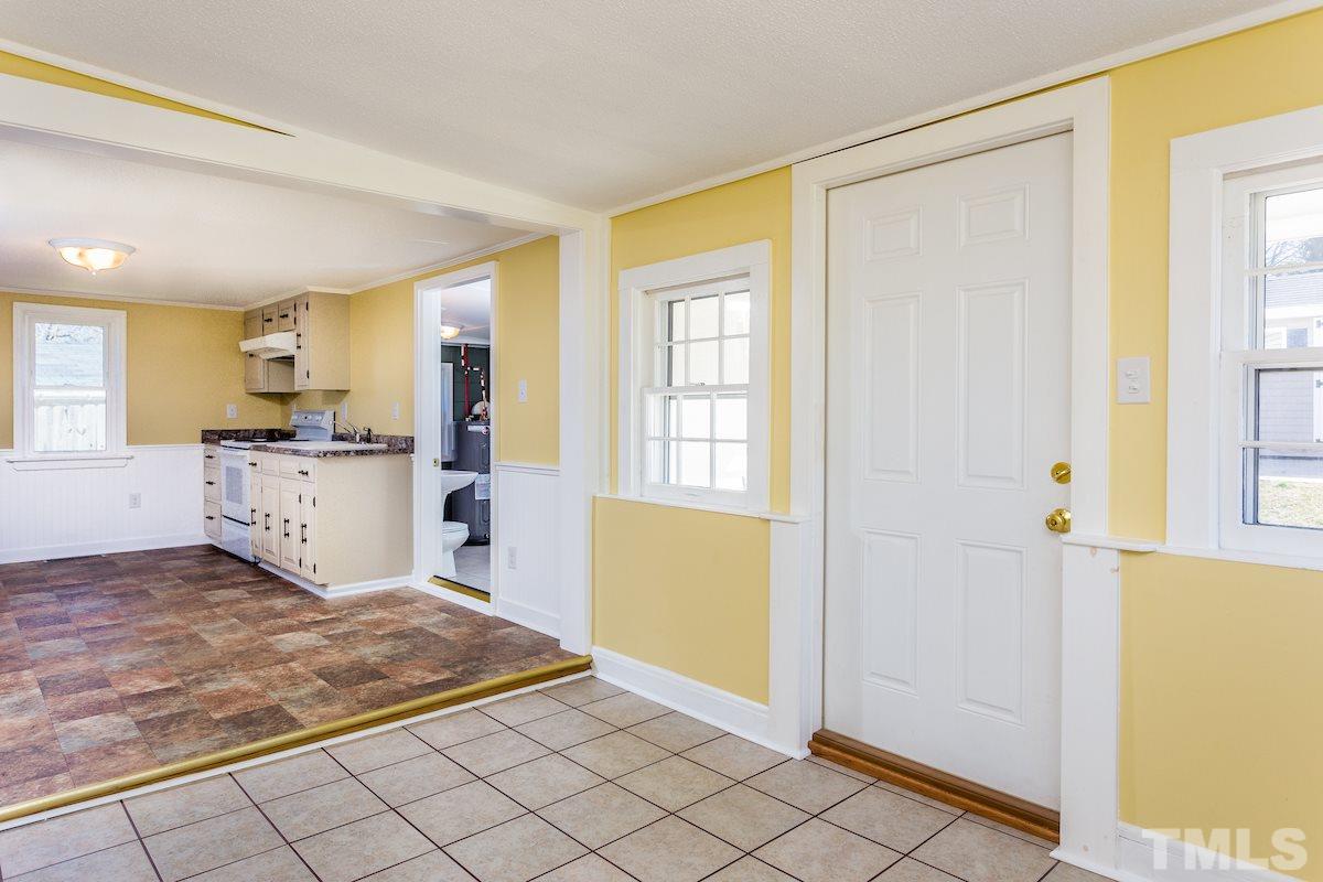 161 Prospect Avenue Raleigh, NC 27603 - Photo 11 of 24 a view of a kitchen with a sink and cabinets