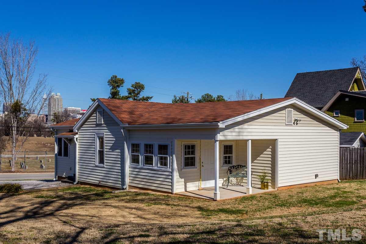 161 Prospect Avenue Raleigh, NC 27603 - Photo 20 of 24 a front view of a house with a garage