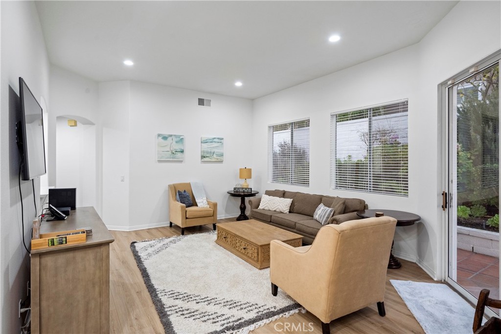 30786 La Mer Laguna Niguel, CA 92677 - Photo 12 of 40 a living room with furniture wooden floor and a flat screen tv