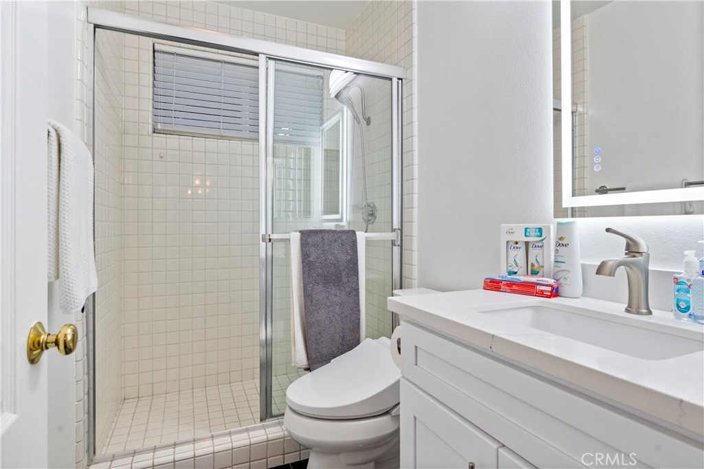 30786 La Mer Laguna Niguel, CA 92677 - Photo 17 of 40 a bathroom with a sink toilet and shower