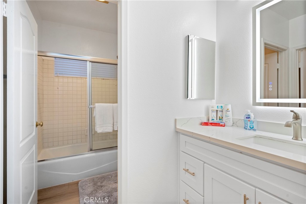30786 La Mer Laguna Niguel, CA 92677 - Photo 26 of 40 a bathroom with a sink and a mirror