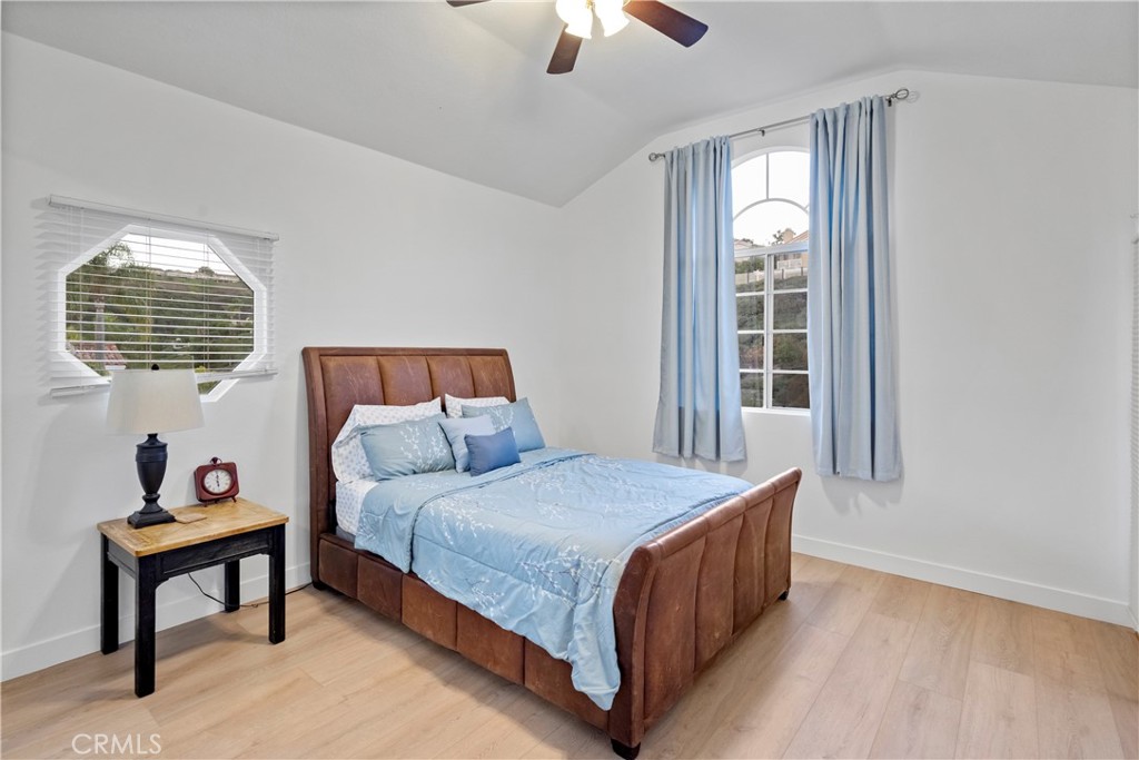 30786 La Mer Laguna Niguel, CA 92677 - Photo 27 of 40 a bedroom with a bed and a window