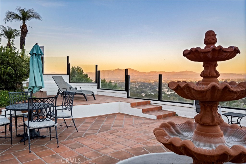 30786 La Mer Laguna Niguel, CA 92677 - Photo 30 of 40 a view of a swimming pool with a table and chairs