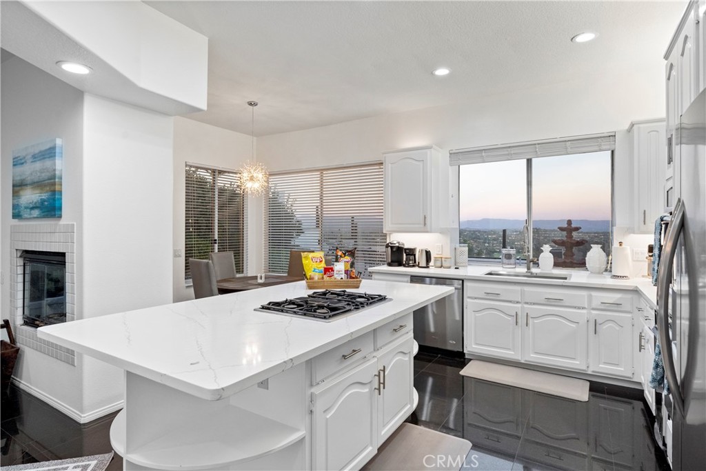 30786 La Mer Laguna Niguel, CA 92677 - Photo 6 of 40 a kitchen that has a stove a sink and a refrigerator
