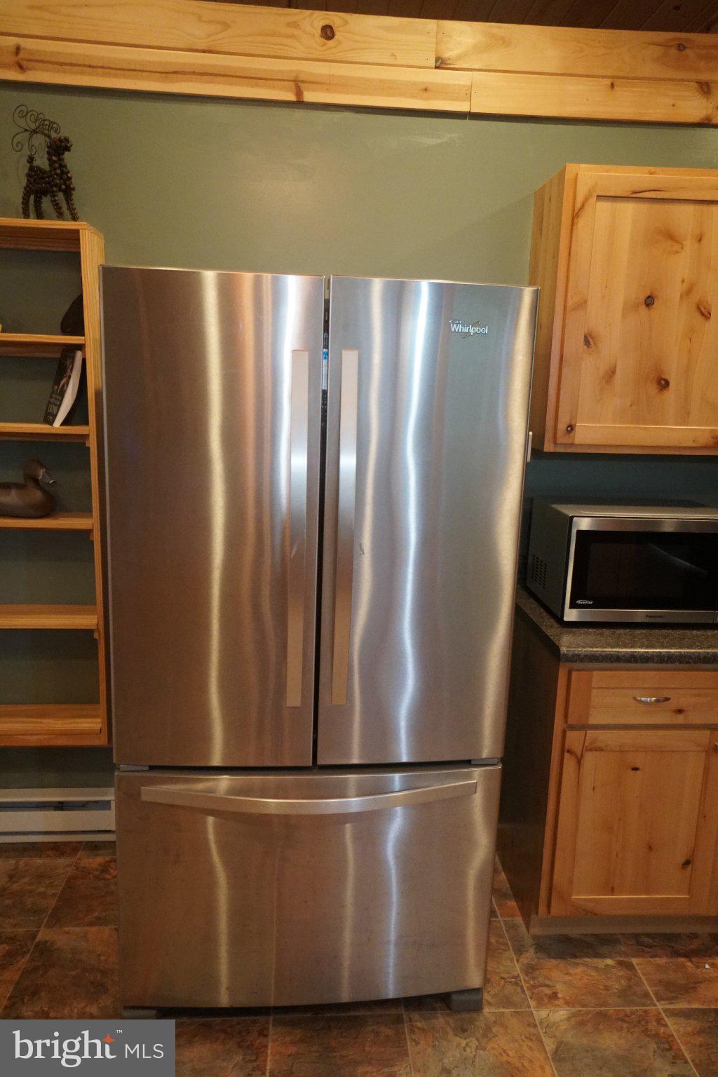 150 Sharp Ridge Lane Franklin, WV 26807 - Photo 37 of 69 Sleek stainless steel refrigerator.