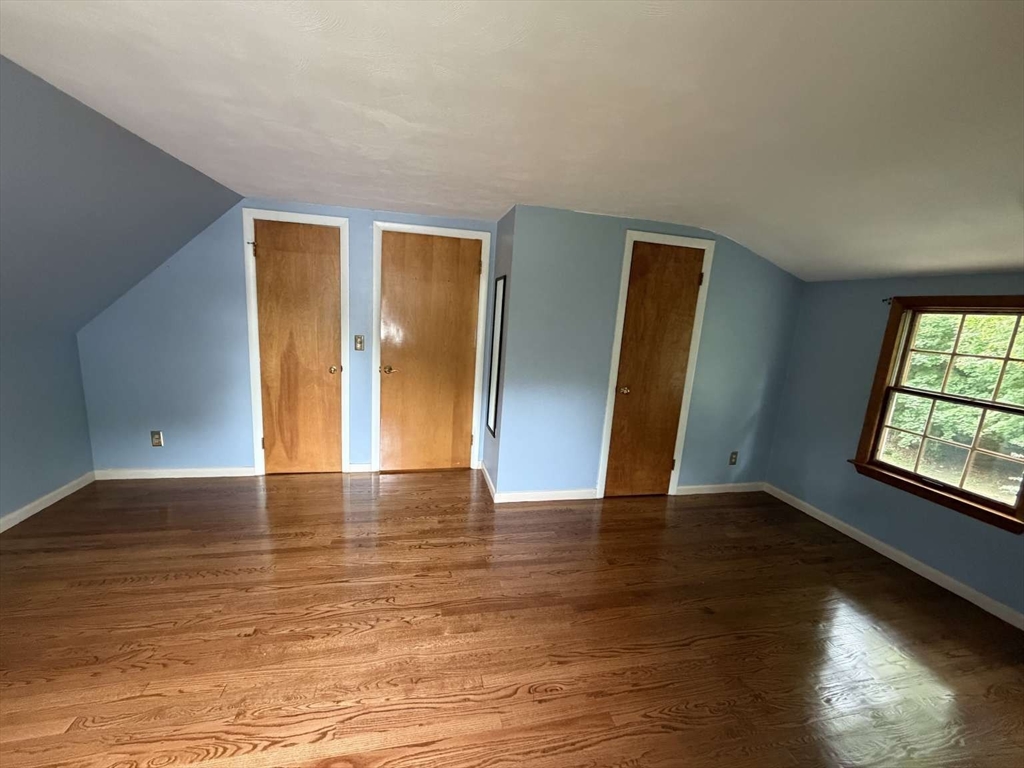 74 Birch Road Longmeadow, MA 01106 - Photo 26 of 38 a view of an empty room with wooden floor and a window