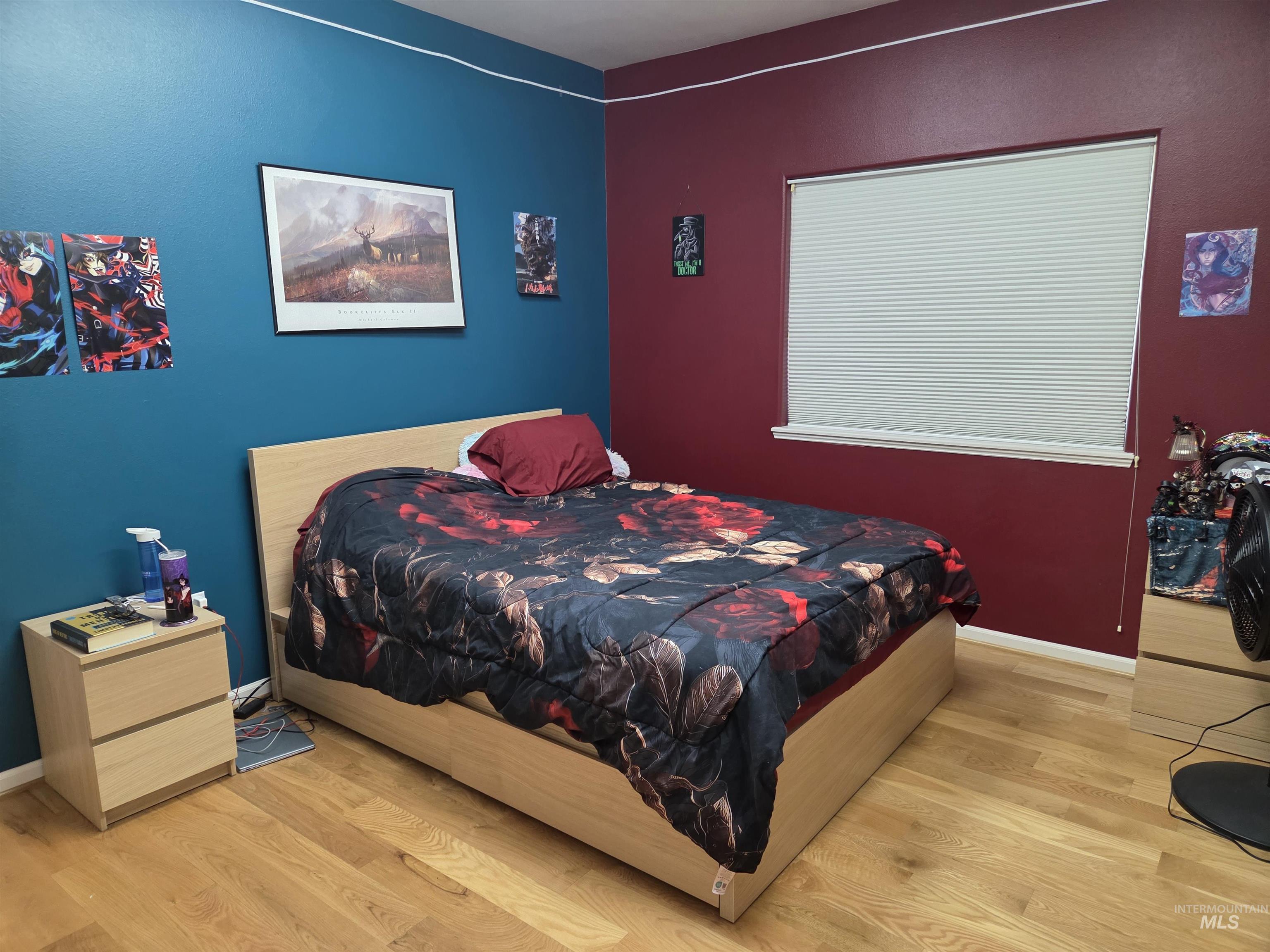 1085 Wallen Road Moscow, ID 83843 - Photo 22 of 50 Hardwood-finish flooring throughout, complemented by two-tone wall paint