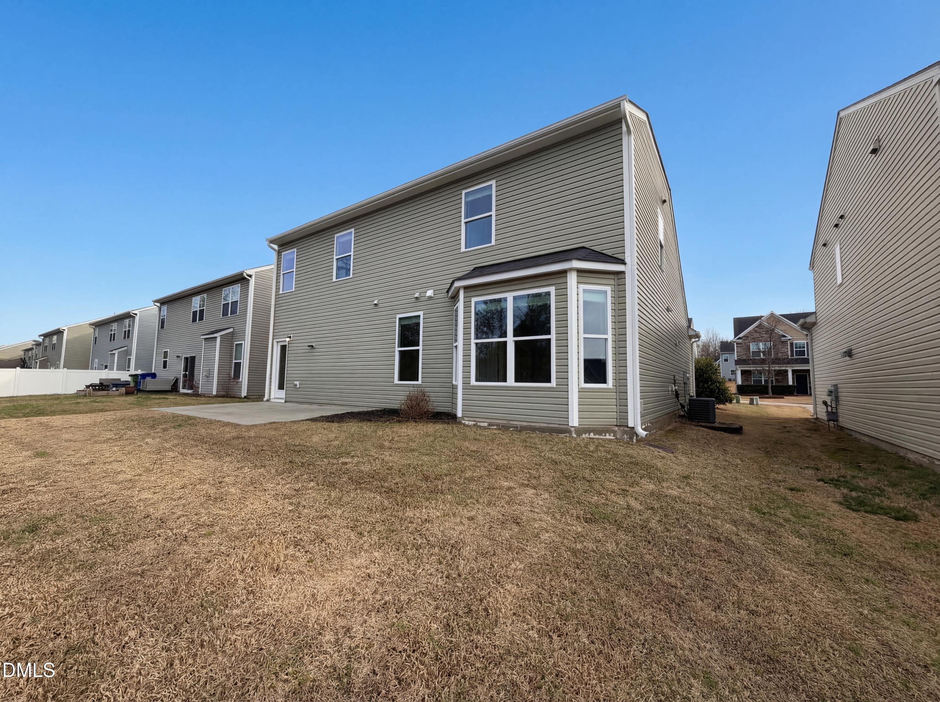 3933 Massey Run Raleigh, NC 27616 - Photo 17 of 19 a view of a house with a backyard
