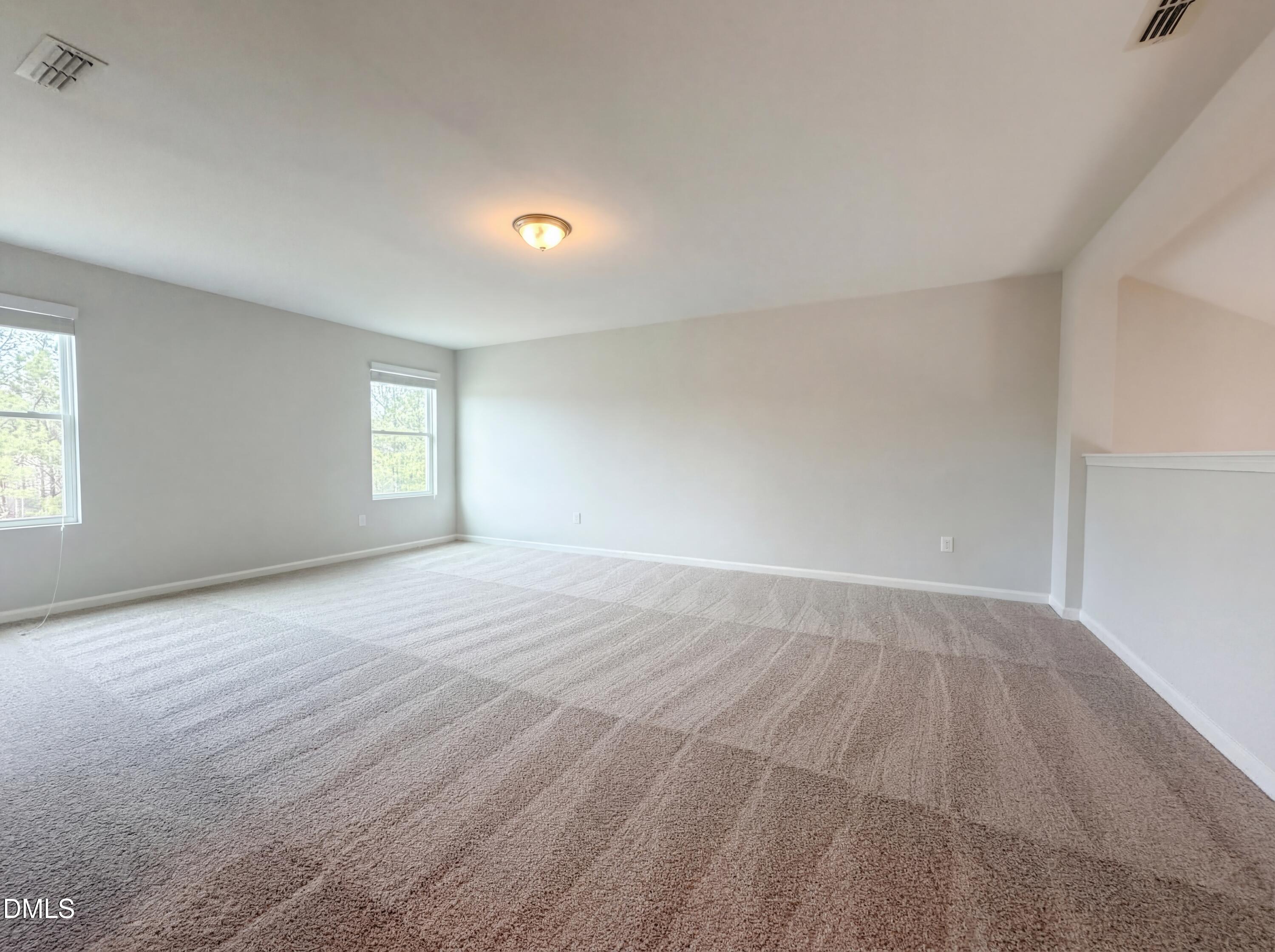 3933 Massey Run Raleigh, NC 27616 - Photo 8 of 19 an empty room with windows
