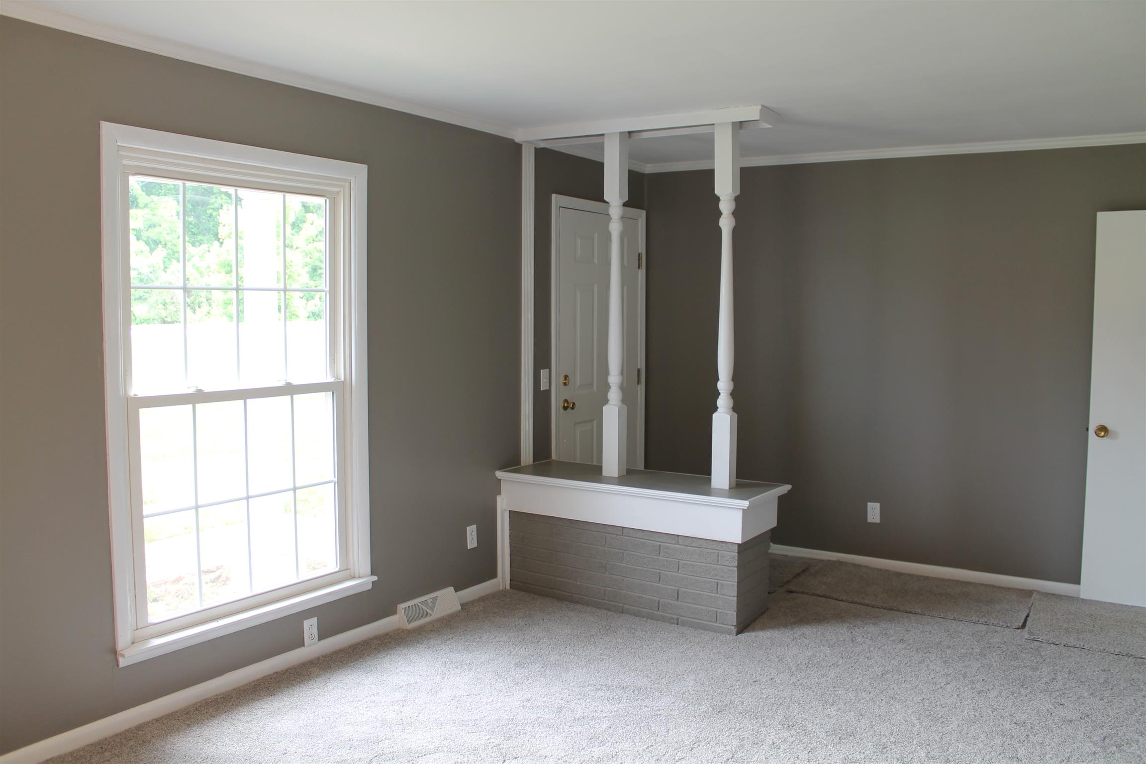 731 Lafayette Road Red Boiling Springs, TN 37150 - Photo 3 of 13 an empty room with windows and closet