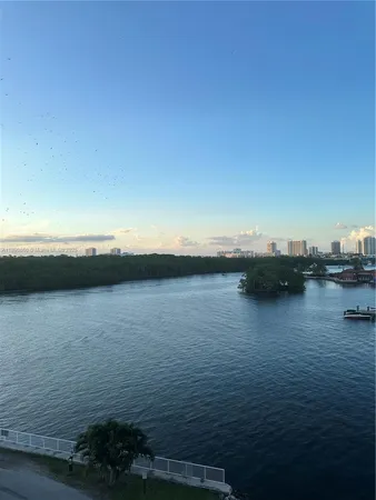 a view of ocean with city