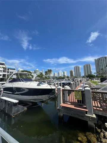a view of a chairs and table in patio