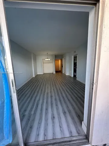 a bathroom with a granite countertop sink a toilet and bathtub