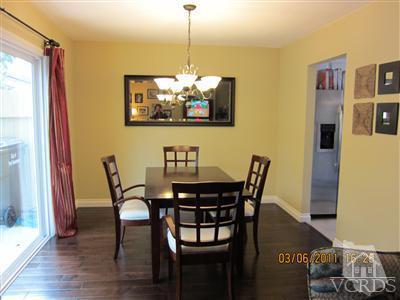 436 Reed Way Port Hueneme, CA 93041 - Photo 2 of 19 a view of a dining room with furniture and wooden floor