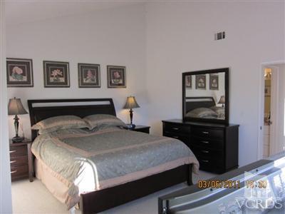 436 Reed Way Port Hueneme, CA 93041 - Photo 15 of 19 a bedroom with a bed and a dresser