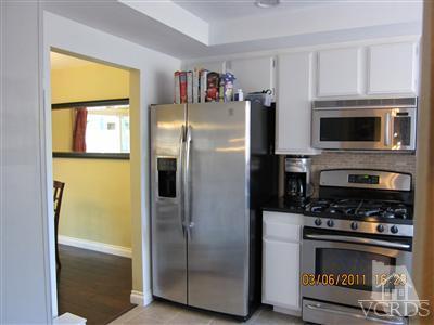 436 Reed Way Port Hueneme, CA 93041 - Photo 4 of 19 a kitchen with stainless steel appliances a refrigerator a stove and a window