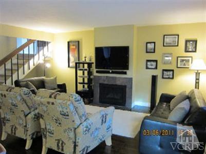 436 Reed Way Port Hueneme, CA 93041 - Photo 7 of 19 a living room with furniture a flat screen tv and a fireplace