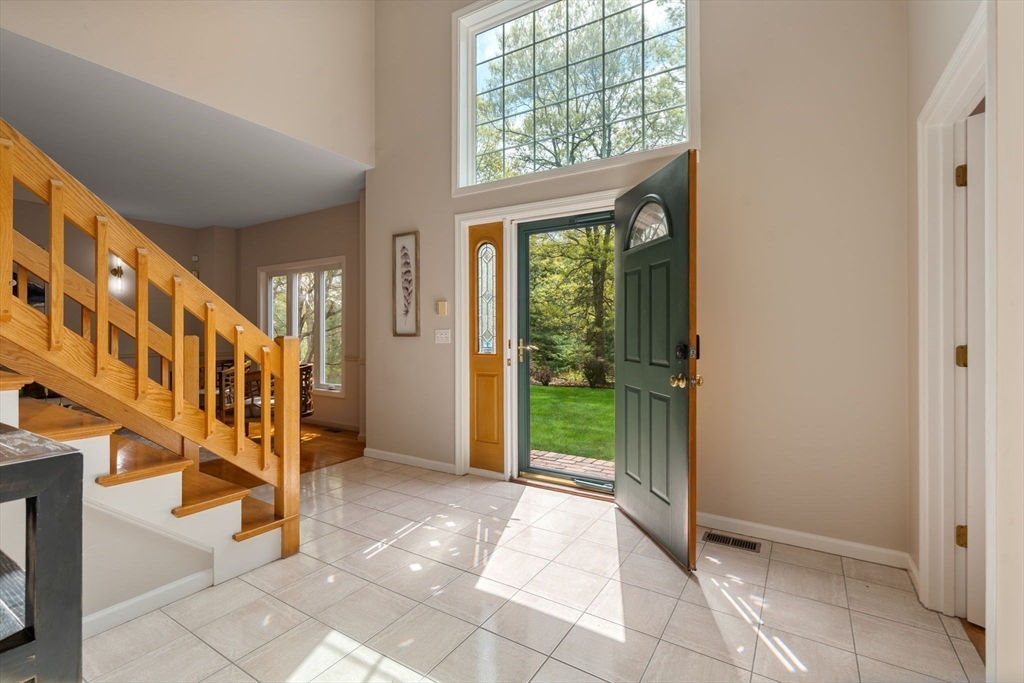 11 Black Elk Road Sharon, MA 02067 - Photo 3 of 28 a view of an entryway with staircase
