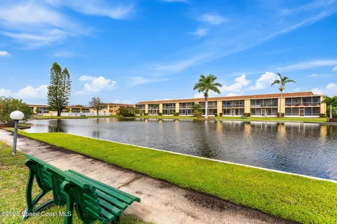 a view of a lake with a house