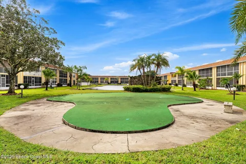 a view of a pool with outdoor space