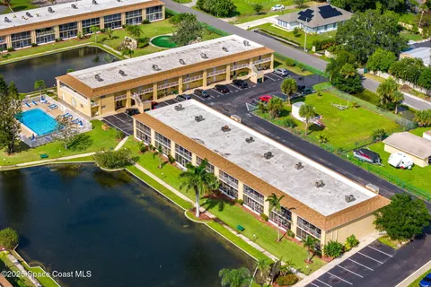 a view of a pool with outdoor space