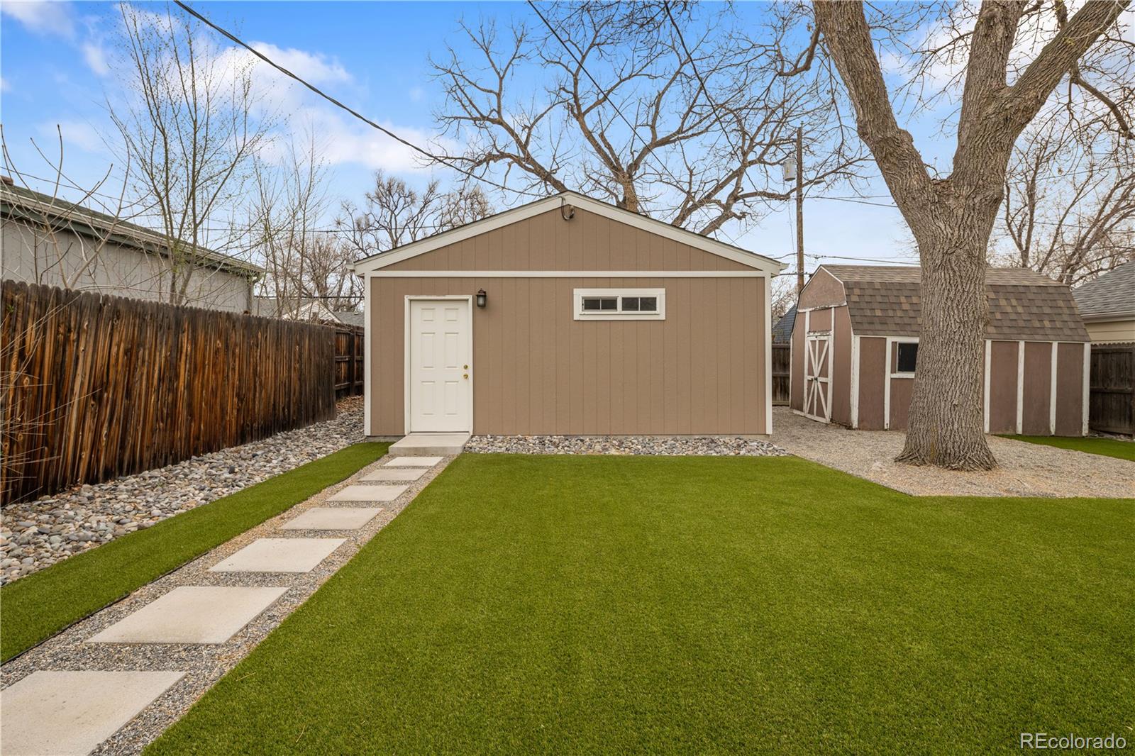 2242 North Lamar Street Edgewater, CO 80214 - Photo 26 of 27 a view of a house with a yard