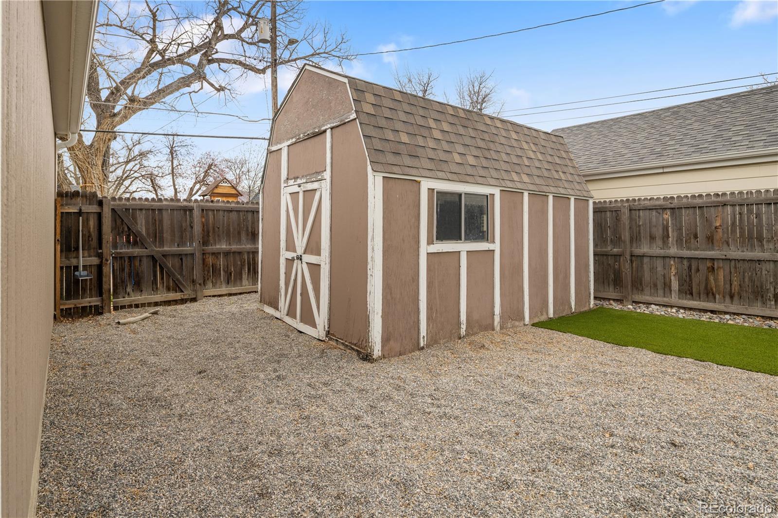 2242 North Lamar Street Edgewater, CO 80214 - Photo 27 of 27 a view of a house with a yard and garage