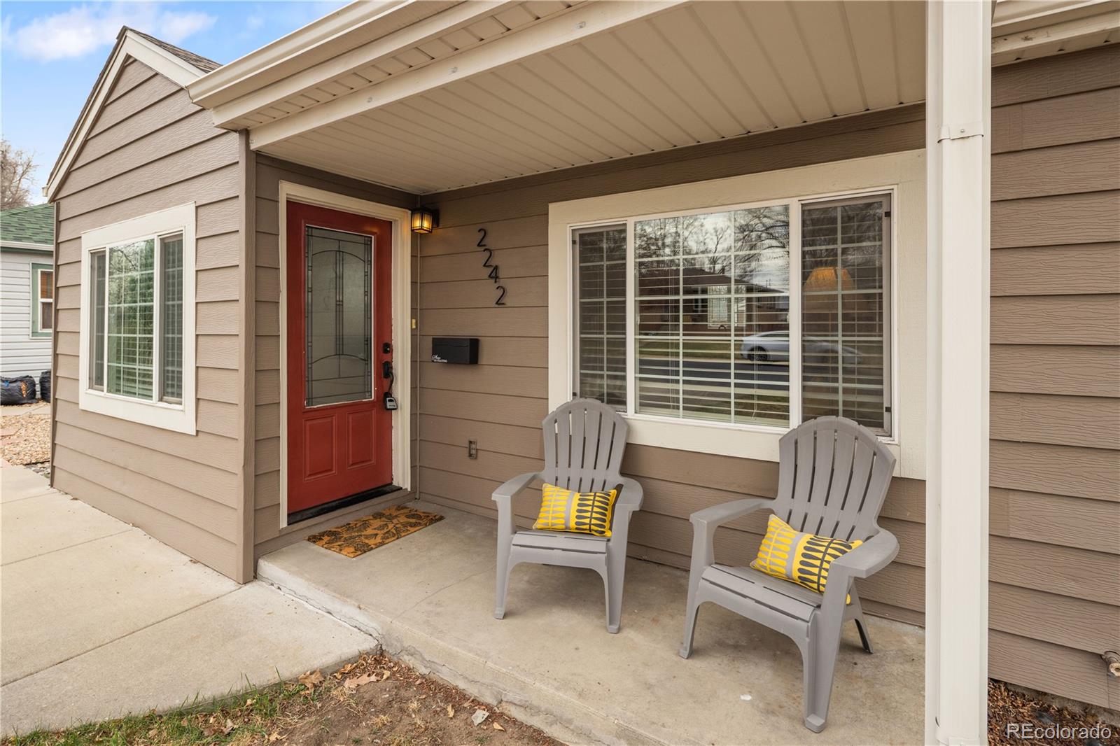 2242 North Lamar Street Edgewater, CO 80214 - Photo 3 of 27 a view of front door with outdoor seating
