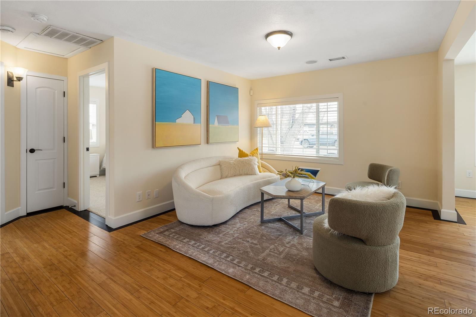 2242 North Lamar Street Edgewater, CO 80214 - Photo 5 of 27 a living room with furniture and a window