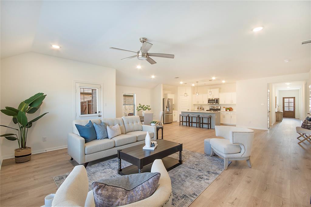 544 Hickory Rdg Drive Van Alstyne, TX 75495 - Photo 11 of 30 a living room with furniture and a wooden floor