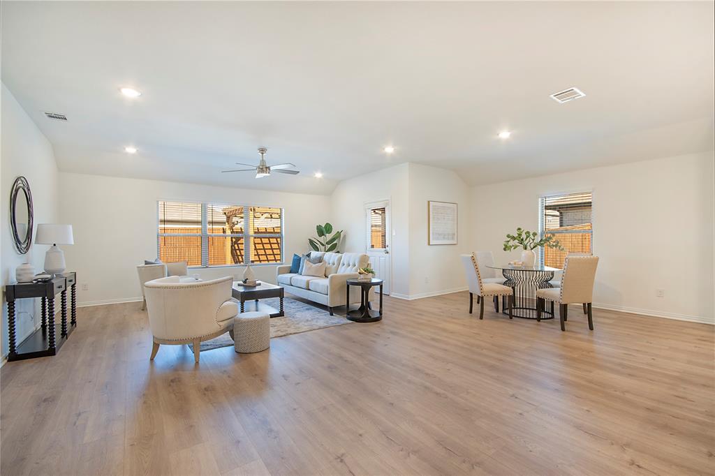 544 Hickory Rdg Drive Van Alstyne, TX 75495 - Photo 12 of 30 a living room with furniture and a wooden floor