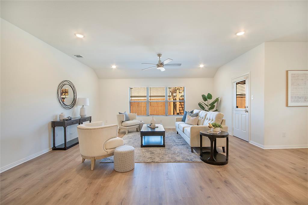 544 Hickory Rdg Drive Van Alstyne, TX 75495 - Photo 14 of 30 a living room with furniture and a wooden floor