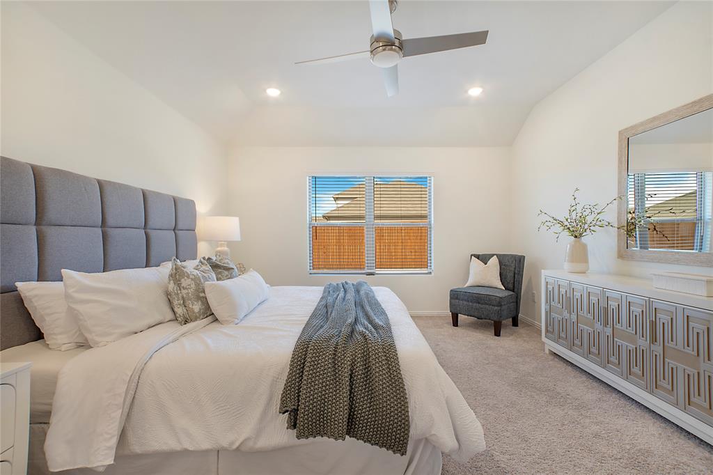 544 Hickory Rdg Drive Van Alstyne, TX 75495 - Photo 20 of 30 a bedroom with a bed and wooden floor