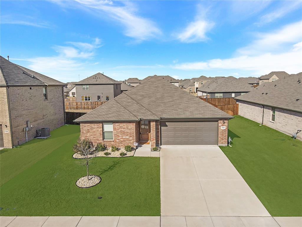 544 Hickory Rdg Drive Van Alstyne, TX 75495 - Photo 4 of 30 a view of a big house with a big yard