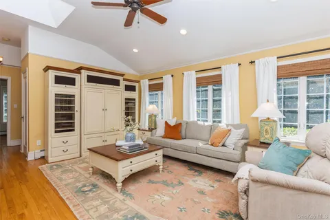 a living room with furniture and a table