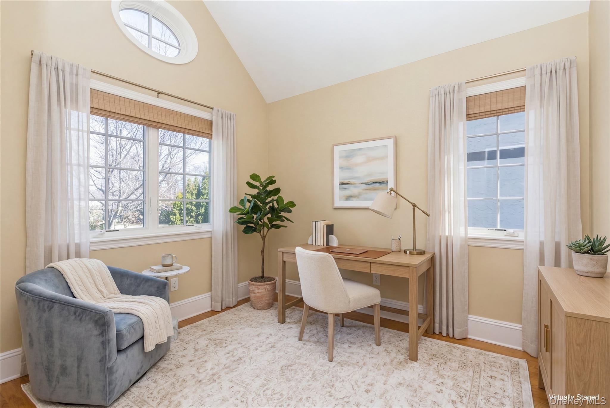 46 Wyatt Road Garden City, NY 11530 - Photo 21 of 32 a living room with furniture and a window