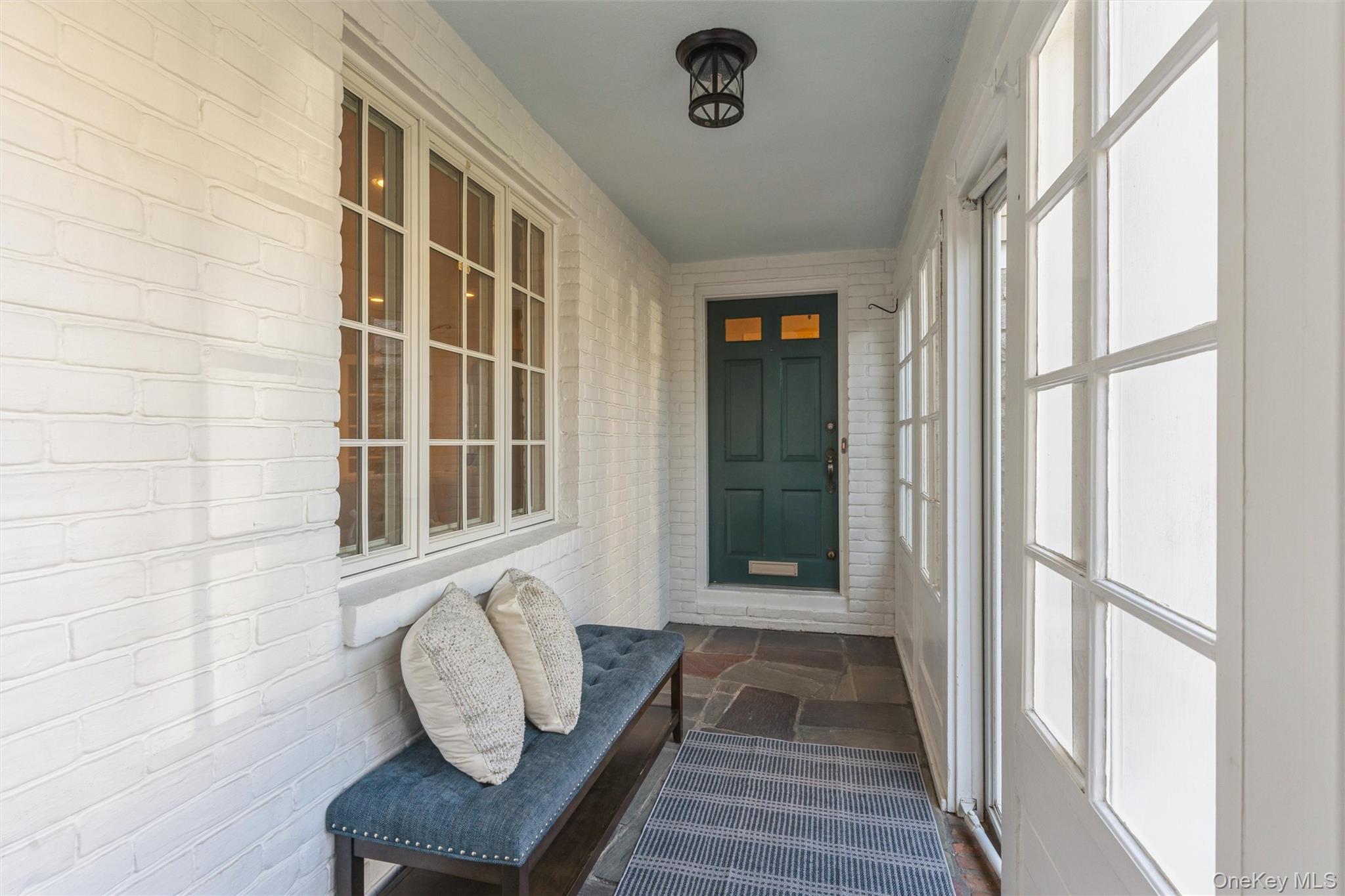 46 Wyatt Road Garden City, NY 11530 - Photo 3 of 32 a view of front door of house with stairs