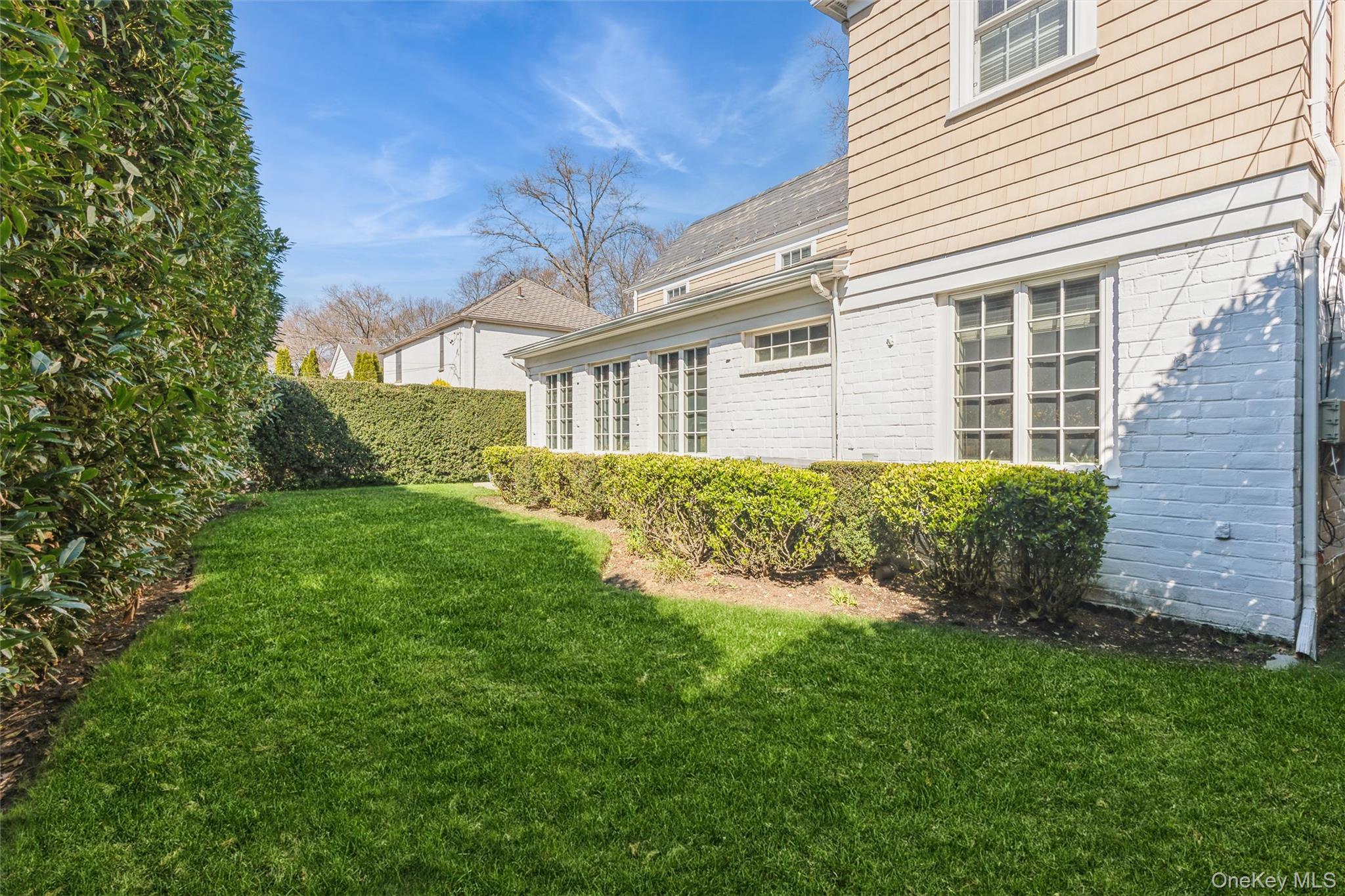 46 Wyatt Road Garden City, NY 11530 - Photo 31 of 32 a view of a house with a garden