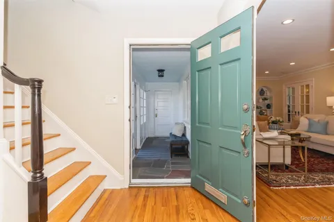a view of a living room and bathroom