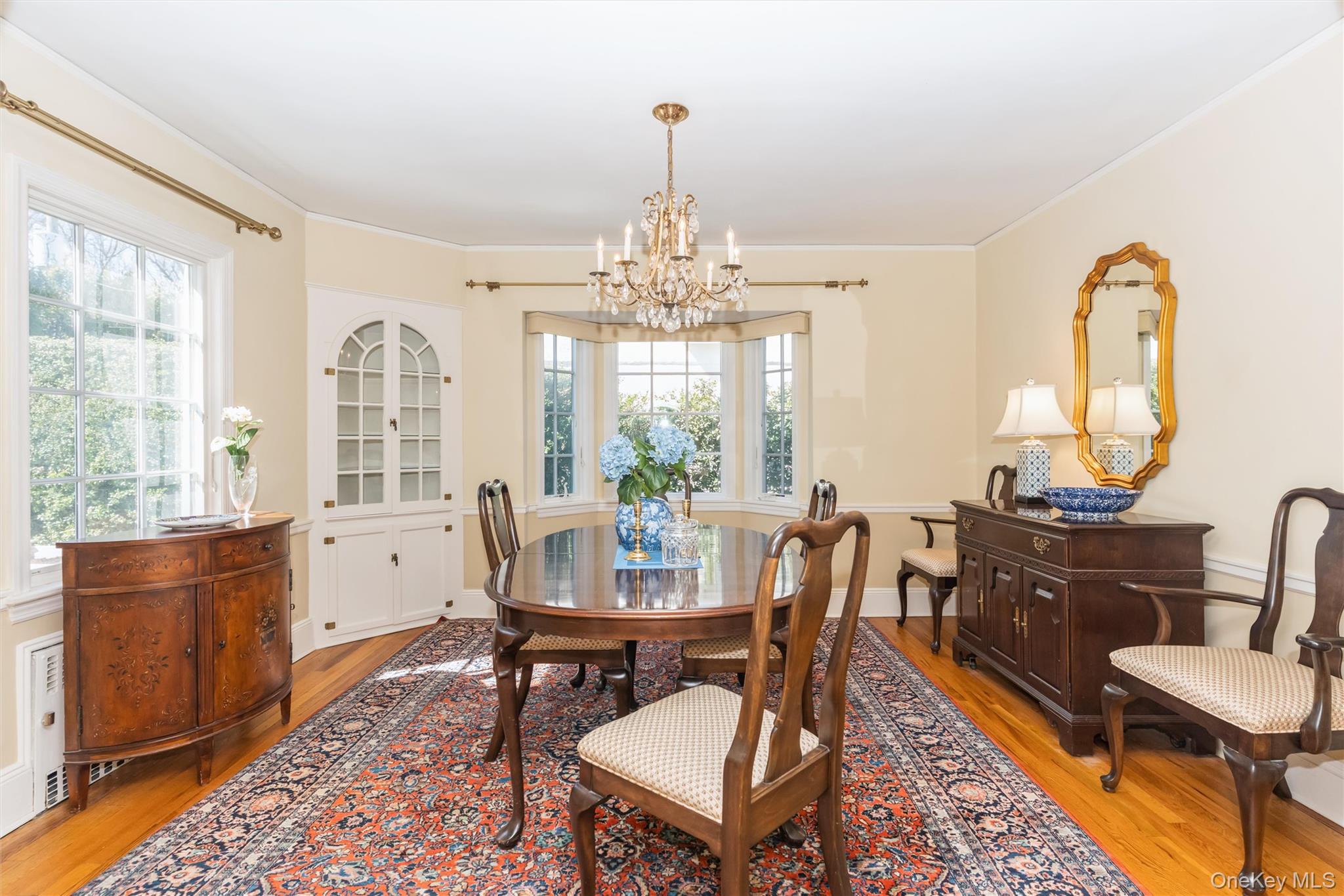 46 Wyatt Road Garden City, NY 11530 - Photo 10 of 32 a view of a dining room with furniture window and wooden floor