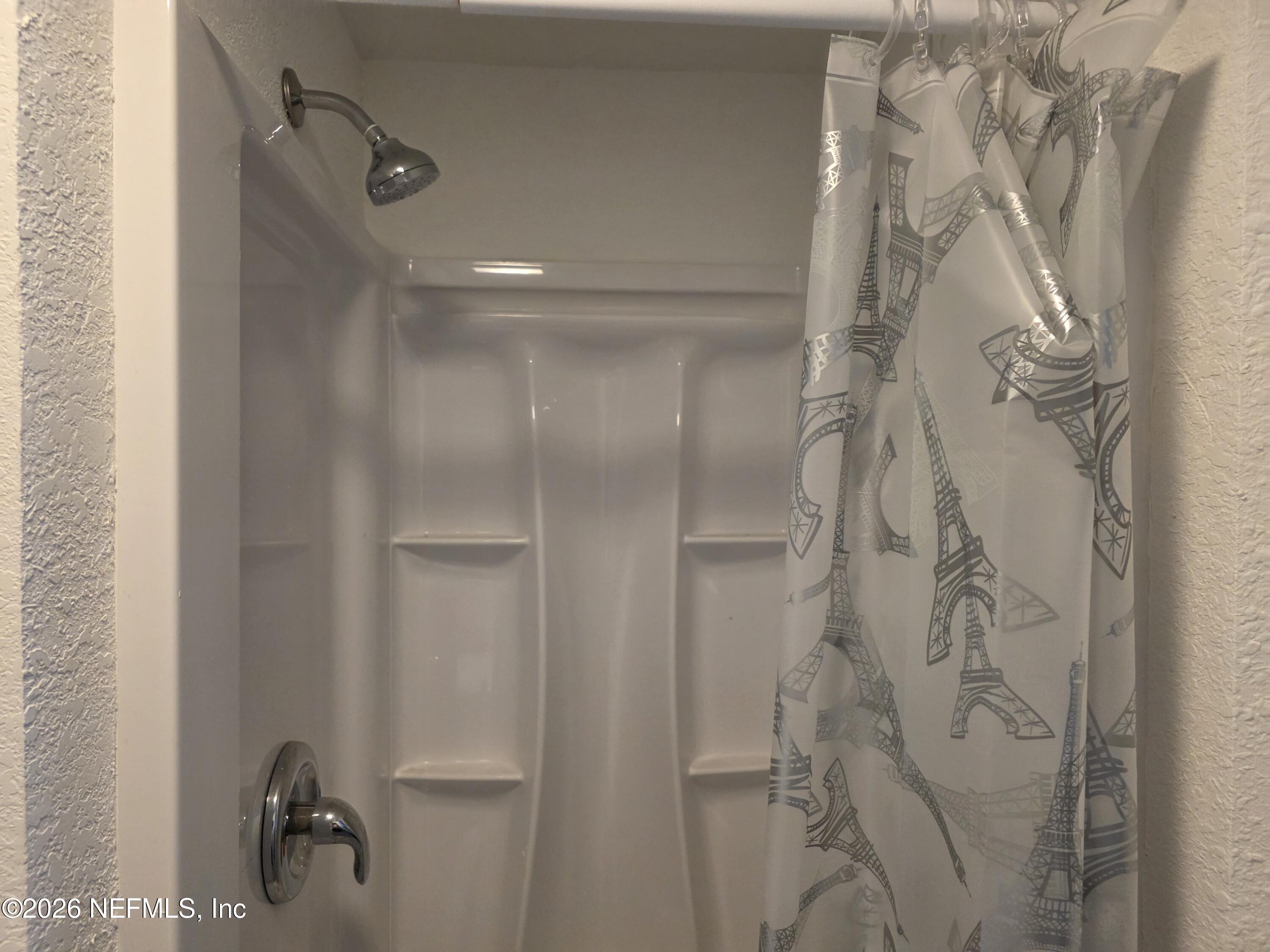 1949 West 6th Street Jacksonville, FL 32209 - Photo 6 of 15 a bathroom with a glass shower door