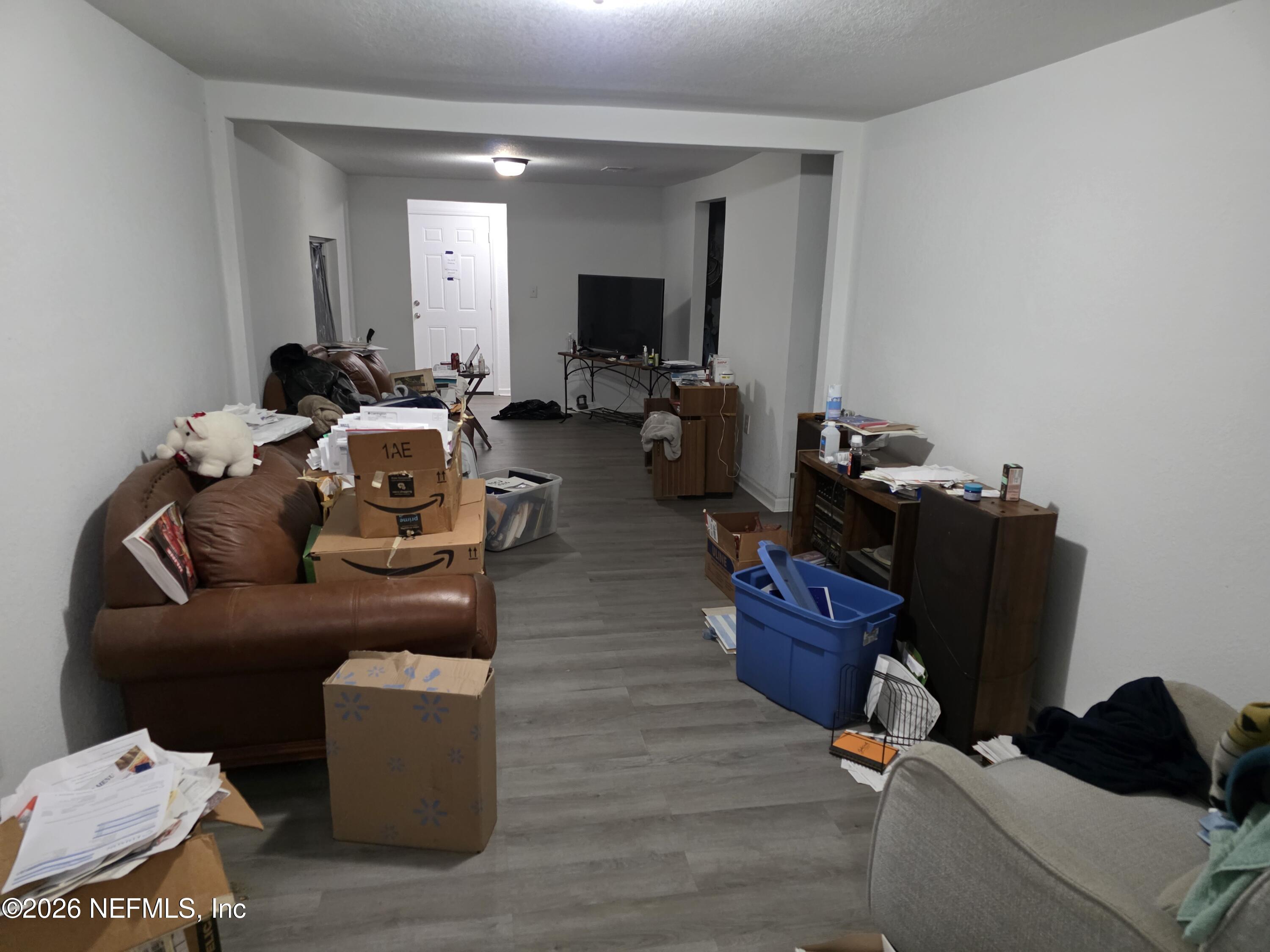 1949 West 6th Street Jacksonville, FL 32209 - Photo 9 of 15 a living room with furniture and a flat screen tv